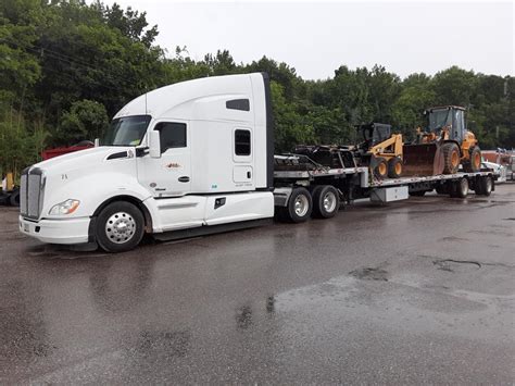 strapping a skid steer|skid steer trailer loading instructions.